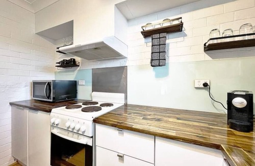 Batehaven Apartamento | Manhattan - Stylish 1BR Beachfront on Casey’s