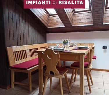 Alba Apartamento | MANSARDA MARMOLADA sui campi da sci