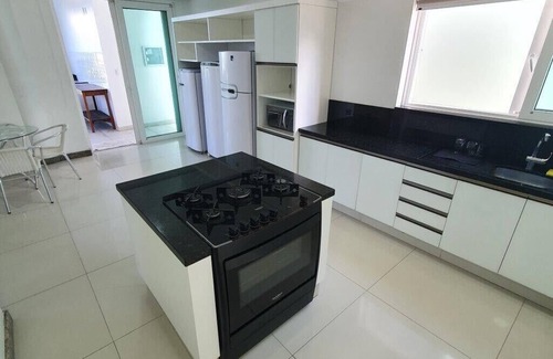 Balneario Camboriu Casa | Mansión frente al mar pie en la arena con piscina en Balneário Camboriú