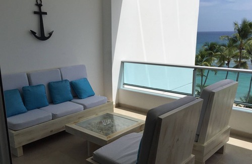 Juan Dolio - El Pueblo Condominio | Marbella Resort Un hermoso, de lujo, frente al mar condominio con dos habitaciones.