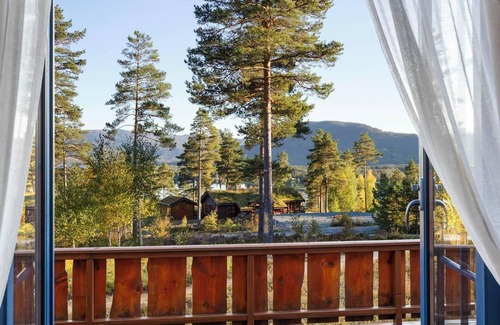 Vradal Casa | Marit's Hytte is a typical Norwegian holiday home, suitable for 6 to 8 people. Enjoy the fantastic view from the spacious veranda of this house.