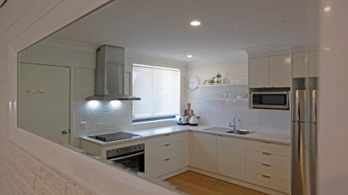 Bermagui Casa | Marlin Waters Unit 2 walk to beach and river Bermagui