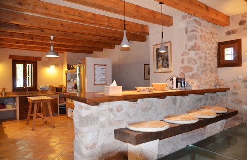 Cabra del Camp Casa | Una auténtica casa de vacaciones de alta calidad con piscina natural.