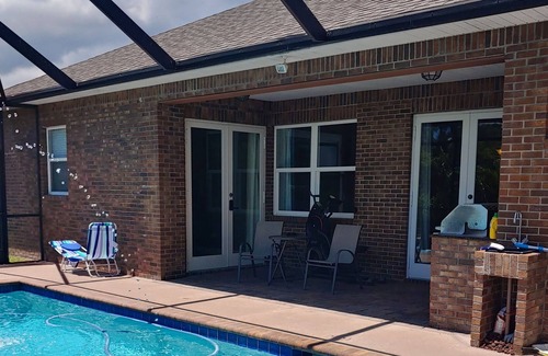 Tropic Apartamento | Master bedroom suite with pool. Eight minutes to beaches.