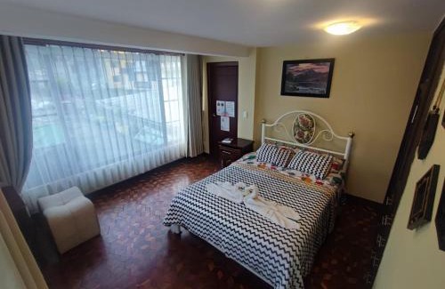 Banos de Agua Santa Casa | MATRIMONIAL TURI centro de la ciudad, garaje