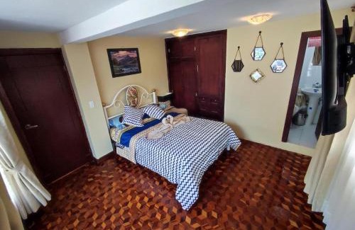 Banos de Agua Santa Casa | MATRIMONIAL TURI centro de la ciudad, garaje