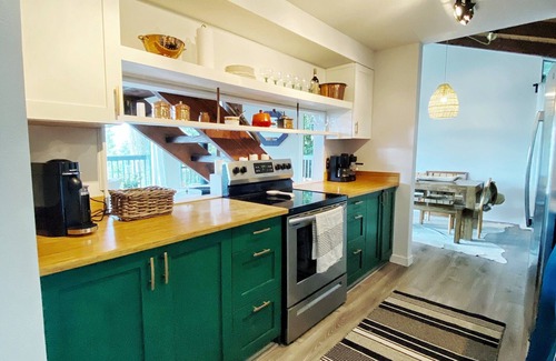 Sudden Valley Casa | mbrace nature in this bright home that has gorgeous views to the lake and forest