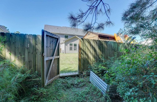Moncks Corner Casa | Media Room & Yard: Modern Moncks Corner Home