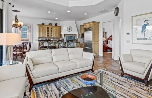 St. Tropez Casa | Mediterranean-style home with pool & hot tub access, W/D, AC & golf cart