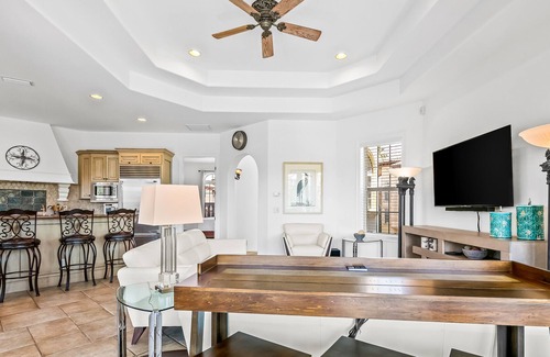 St. Tropez Casa | Mediterranean-style home with pool & hot tub access, W/D, AC & golf cart