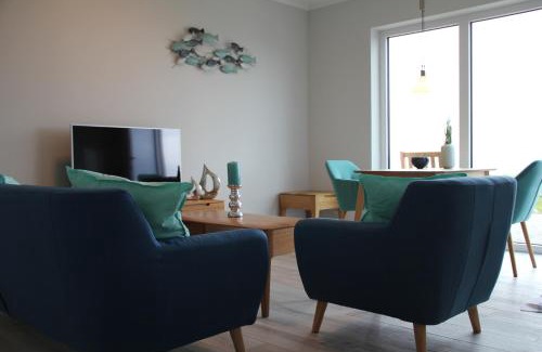 Fehmarnsund Apartamento | Meerblick Fehmarnsund 1 - direkt am Strand