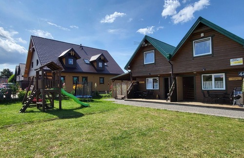 Sarbinowo Cabina | Merlin Cottage – For Families, Seniors, with Disability Features