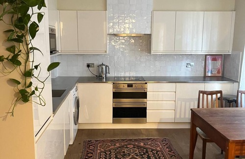 Farringdon Condominio | Midcentury apartment in the heart of London