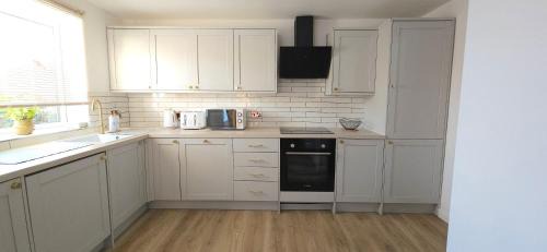 Milton Keynes Apartamento | Milton Keynes 3BR modern Home, Sleeps 5, Families, Free Parking