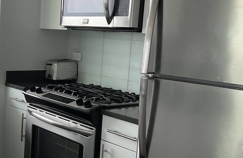 Hunters Point Apartamento | Mind-blowing City Views on East River - 10 mins to Manhattan!