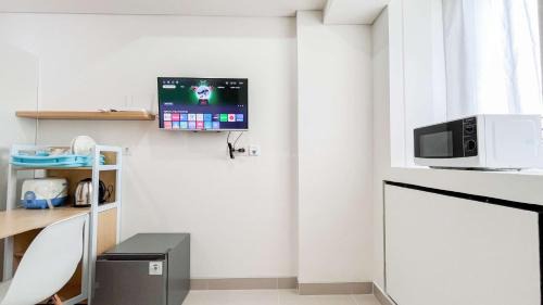 Makassar Apartamento | Minimalist Studio (No Kitchen) at Bandaraya - Tallasa City Makassar Apartment By Travelio