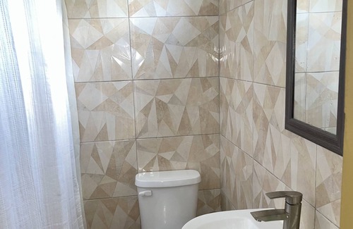 Middle Quarters Casa | Minutes from Ys Falls, Safari and Zoo— w/ Bar and Restaurant onsite