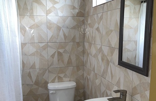 Middle Quarters Casa | Minutes from Ys Falls, Safari and Zoo— w/ Bar and Restaurant onsite