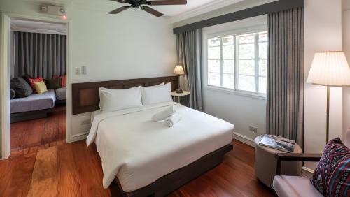 Bagong Lipunan Ng Crame Apartamento | MiraNamin Nest LIRYO Suite in Unique Historic Home - Garden Access, Family Friendly, Shared Kitchen