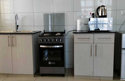 Riruta Apartamento | Modern, 1BR apartment with a contemporary kitchen