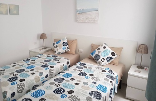 Los Gigantes Apartamento | Modern 2 bed in popular Los Gigantes with private garden, terrace & sea views