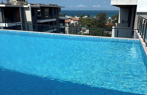 Masaki Apartamento | Modern 2BR Condo with Gym & AC in Upscale Masaki