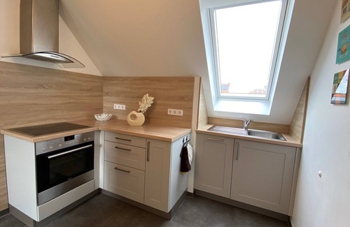 Radensdorf Apartamento | Moderno apartamento de 4 estrellas con 2 dormitorios, amplio jardín y parque infantil.