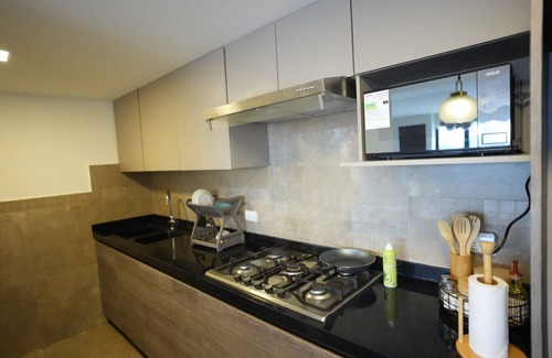 Cuenca Apartamento | Modern and Cozy 3-bedroom apartment with WiFi, fitness room in charming Cuenca
