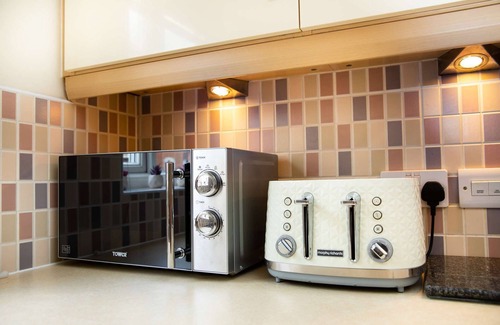 Newport Pagnell Apartamento | Moderna y espaciosa casa lejos de casa con 9 camas.