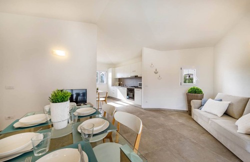 Monte Petrosu Apartamento | apartamento moderno a 5 min. del mar con piscina, aire acondicionado y wi-fi