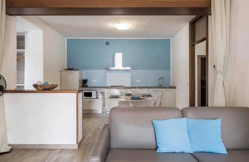 Cassone Apartamento | Moderno apartamento "Fiocco" con vistas al lago, Wi-Fi, aire acondicionado y terraza