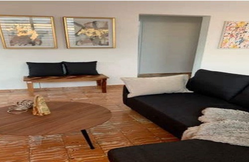 Sagrado Corazon Apartamento | Moderno apartamento en San Juan cerca de la playa, bares y restaurantes.