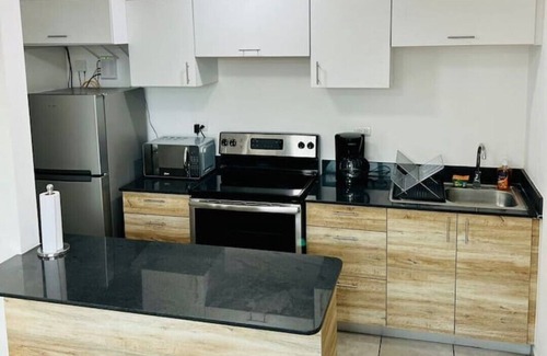 Zona 11 Apartamento | Modern apartment in zone 11 / MUU 908C