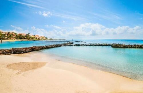 Puerto Aventuras Apartamento | Modern Apartment with Private Terrace and Golf Course View, free parking in Puerto Aventuras