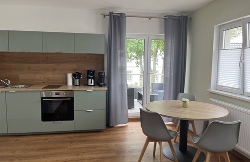 Groemitz Apartamento | Apartamento moderno con terraza propia en la azotea, ubicado en el patio histórico