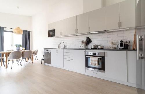Bastad Casa | Modern Beachy Home with Terrace Charm First Floor