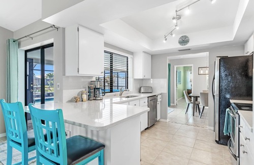 Cape Coral Casa | Modern Coastal Home w/Heated Pool & Waterfront Views!