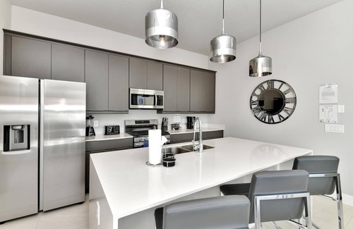 Reunion Casa | Modern Condo with Large Outdoor Patio. Reunion Resort Water Park Access near Disney at Spectrum Resort Orlando by Rentyl – B9 #136