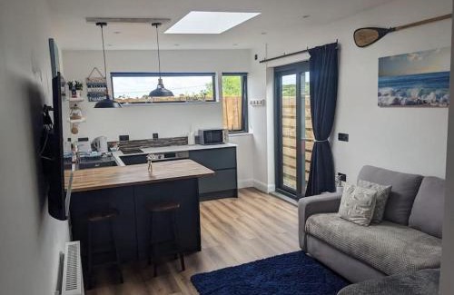 Mawnan Smith Apartamento | Modern cosy apartment walking distance to many cove beaches and coast path walks as well as the famous Helford river