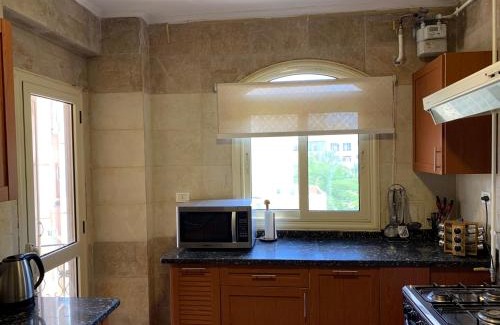 Sheikh Zayed City Apartamento | Modern downtown Sheikh Zayed Condo