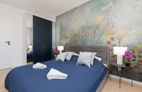 Baluty Apartamento | Modern Elegance Apartment with Parking & AC next to Manufaktura