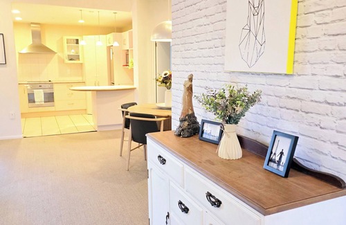 Clive Casa | Modern Family Oasis in Clive Spacious fully furnished 3 bdrm home w/ AC.