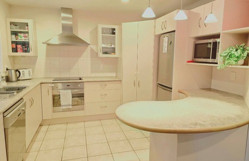 Clive Casa | Modern Family Oasis in Clive Spacious fully furnished 3 bdrm home w/ AC.