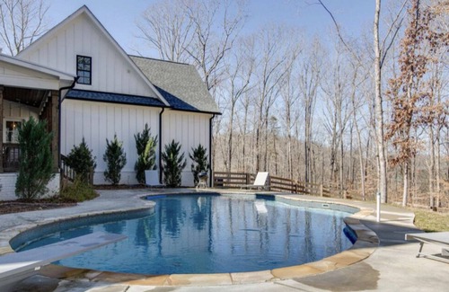 Franklin Casa | Modern farmhouse on 24 acres of trees with a heated pool