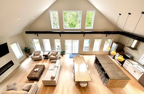 Lion's Head Casa | Modern forest retreat in Stokes Bay! Featuring king beds, cozy bunk rooms, a spacious game loft, firepit, chef’s kitchen, and open-concept living. Perfect for families and groups—close to Bruce Peninsula hiking, beaches, and dark sky stargazing.