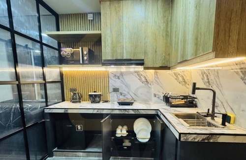 Caloocan Condominio | Modern Industrial Condo near Fairview/North Caloocan with WiFi, AC, Netflix