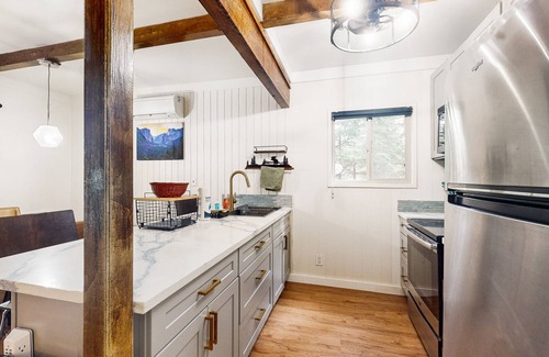 Fish Camp Casa | Modern duplex cabin with fireplace, balcony, & EV charger plus mountain views