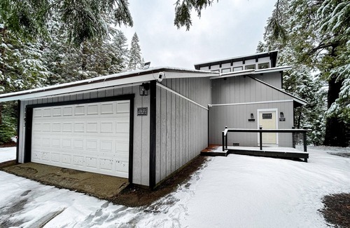 Fish Camp Casa | Modern duplex cabin with fireplace, balcony, & EV charger plus mountain views