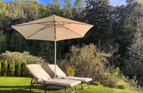 Sant'Andrea in Monte Apartamento | modern, luxury, private entrance, garden, terrace, and stunning mountain views.