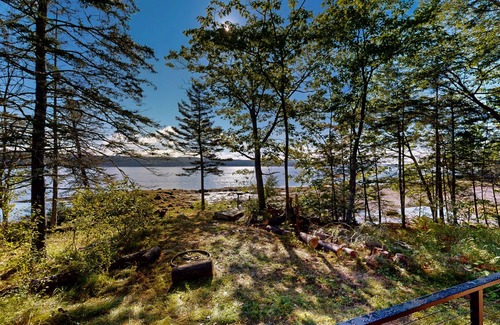 Sandy Point Cabaña | Modern Maine cottage with river views, deck, and a convenient washer/dryer